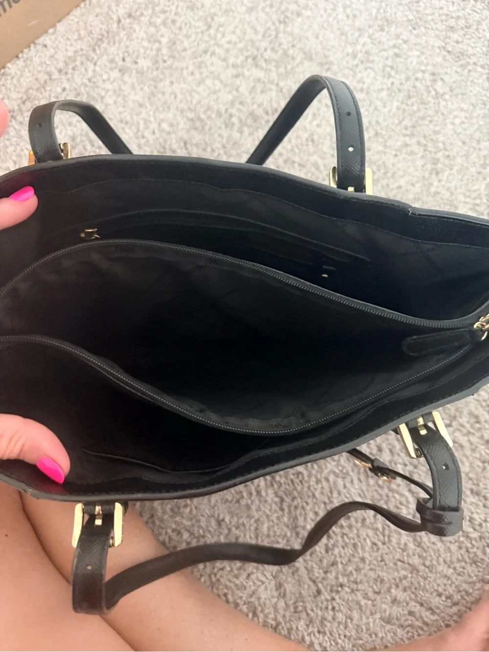 Michael Kors Black Tote with Gold Emblem Accents